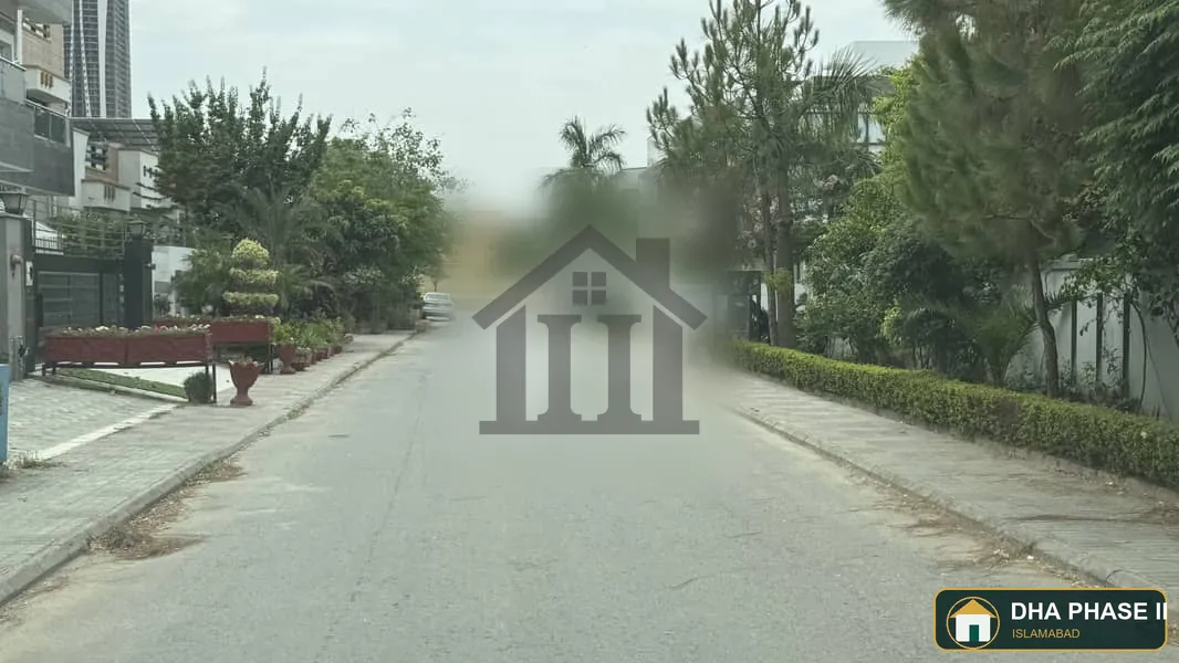 1 Kanal Prime Wide-Street Plot In Sector B, DHA Phase 2 Islamabad Ideal For Living & Investment image 1