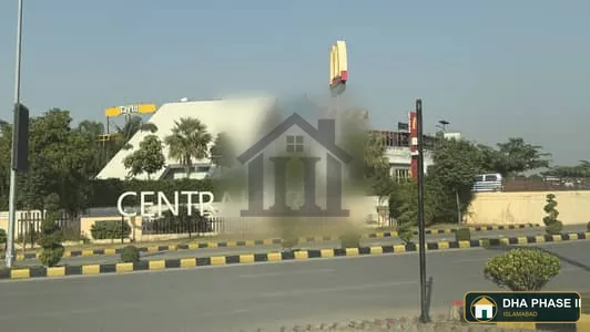 Sector H 70 ft Wide Road 1 Kanal Corner Plot Far Sale image 1