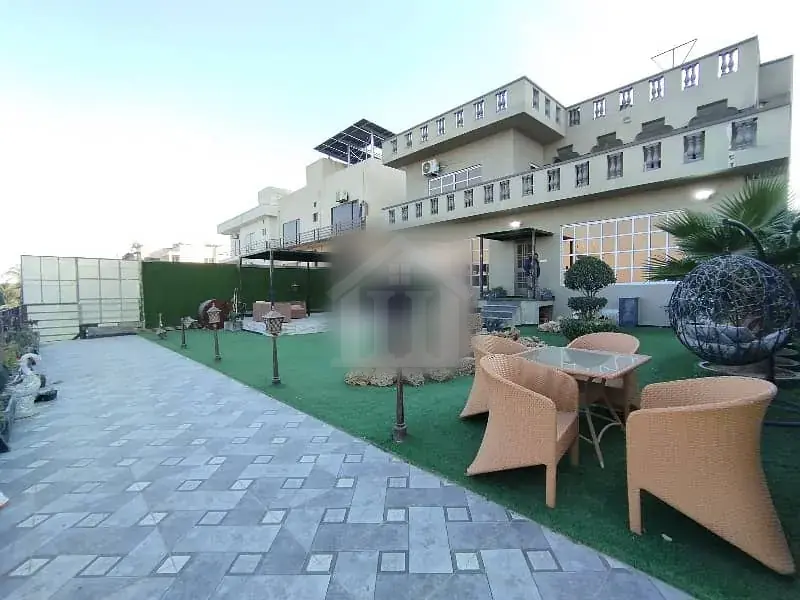 Lawn Prime Location 1.6 Kanal House for Sale in DHA Phase 2 Islamabad